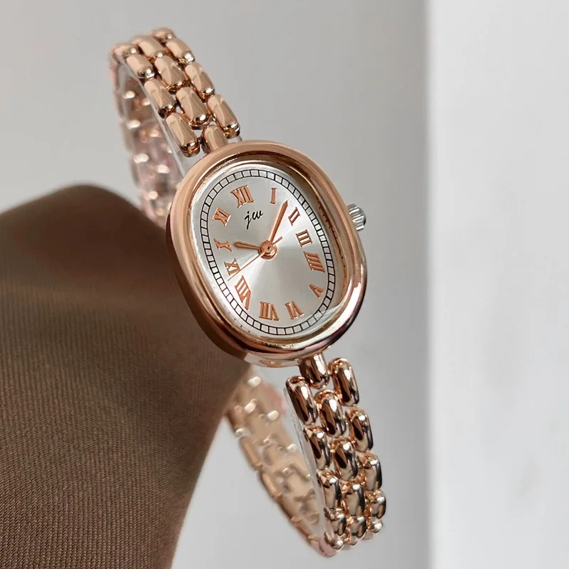 Ladies watch, niche high-value literary and versatile simple temperament women's watch oval disc quartz watch