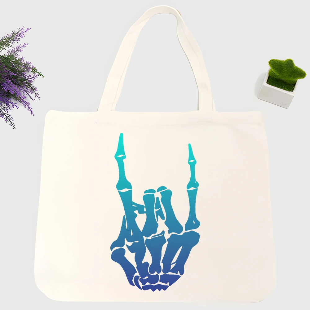 Men's skeleton hand gesture canvas tote bag, streetwear style for daily shopping and casual outings