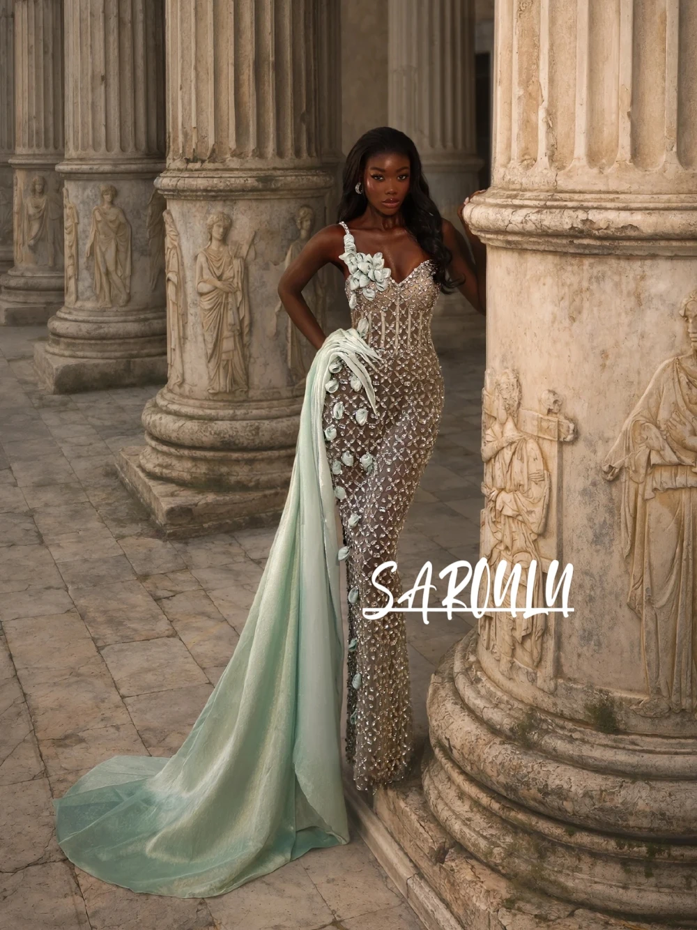 

2026 Haute Couture Mint Green Prom Dress Sheer Beaded Crystals 3D Flower V Neck Mermaid Evening Gown With Long Train Customized
