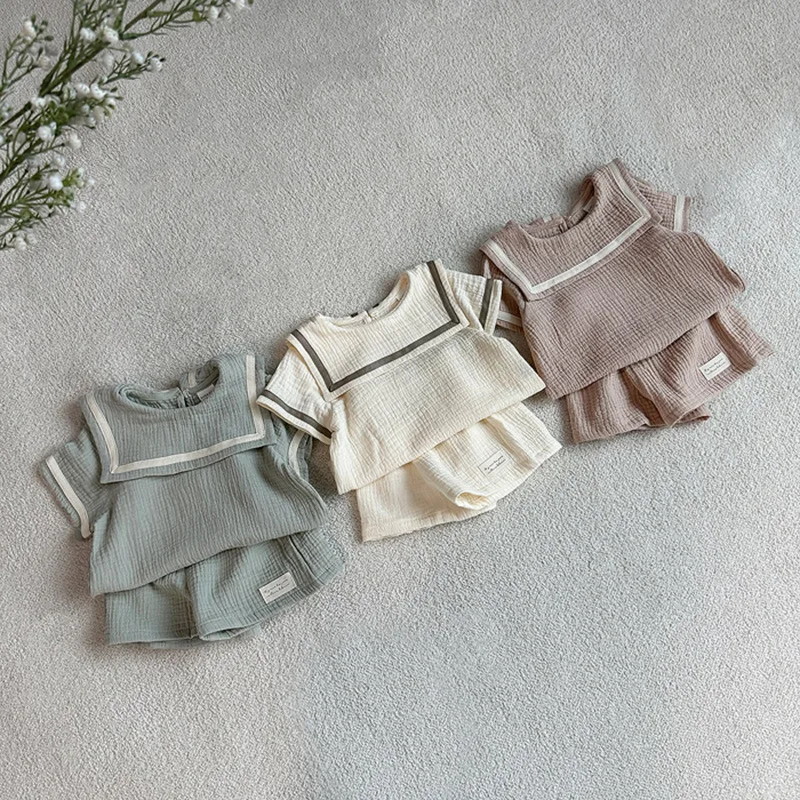 

2026 Summer New Baby Short Sleeve Clothes Set Toddler Boy Girl Solid Lapel Tops + Shorts 2pcs Suit Infant Cotton Yarn Outfits