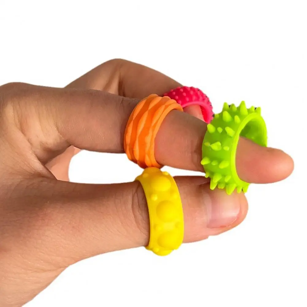 12 ชิ้น Spiky Sensory แหวนนิ้วมือชุดสําหรับวัยรุ่นความเครียดบรรเทา Fidgets Sensory ของเล่น Acupressure แหวนนวดคริสต์มาสของขวัญ