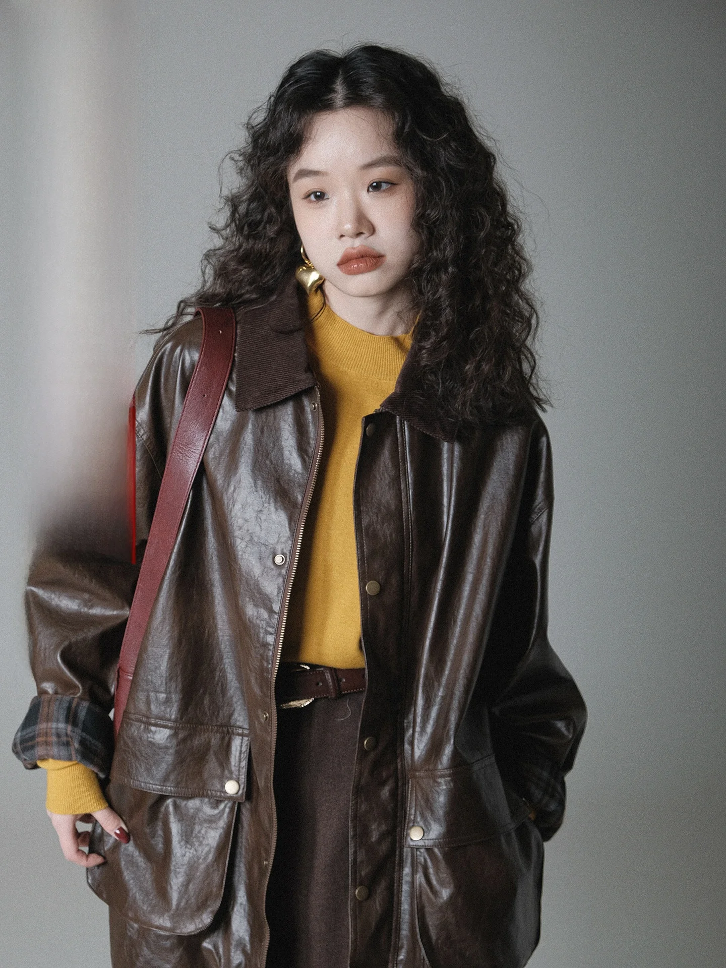 

Loose Fit PU Leather Jaet Ivy Yang Metal Button Flap Collar Inner Cloth Simple Elegance Long Sve mid Length Coat