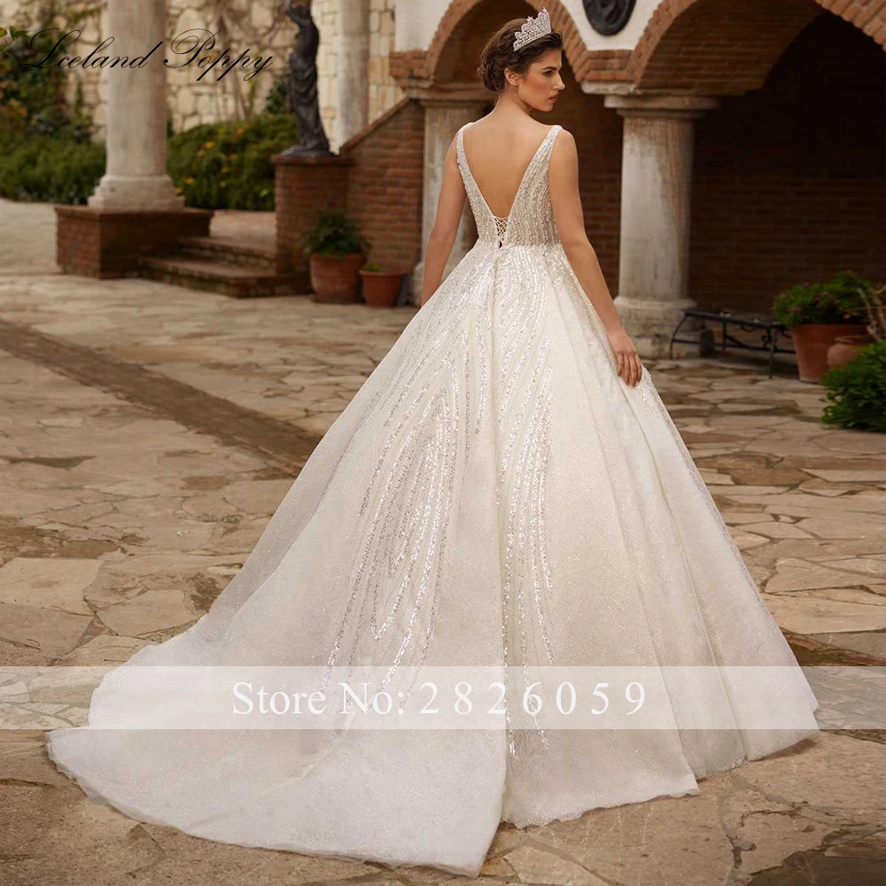 Lceland Poppy Customized A Line V Neck Lace Wedding Dresses Sleeveless Backless Sequined Floor Length Beaded Bridal Gowns