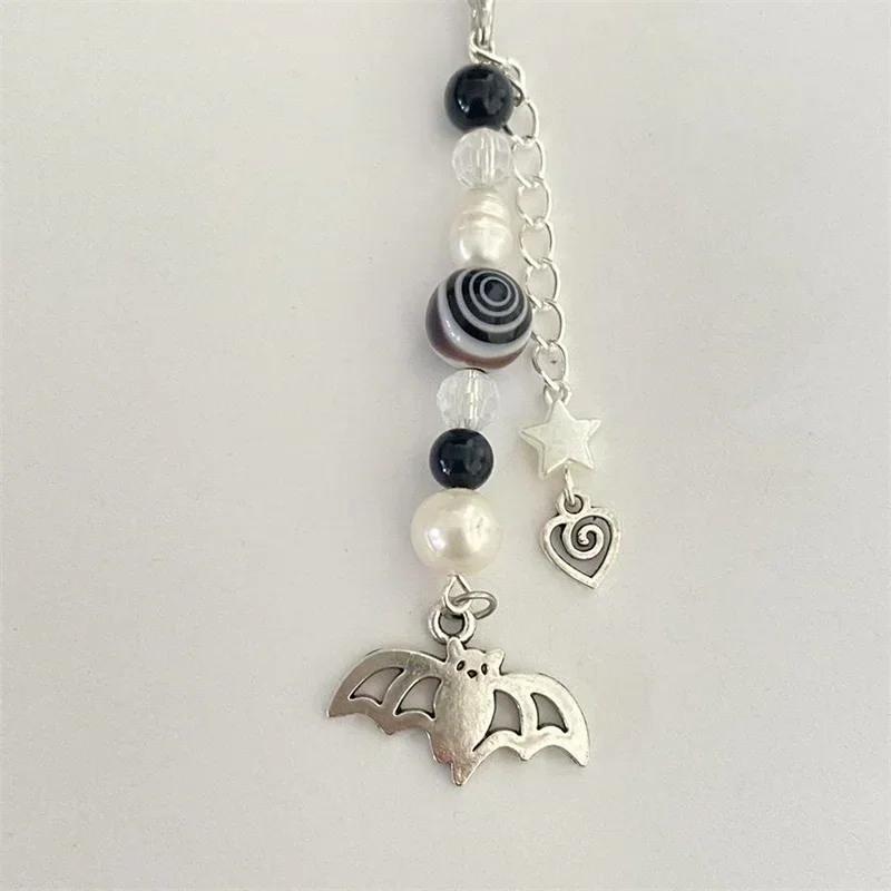 Bat phone charm keychain mobile phone chain,With black beads, swirly glass beads freshwater pearl and heart swirly charm