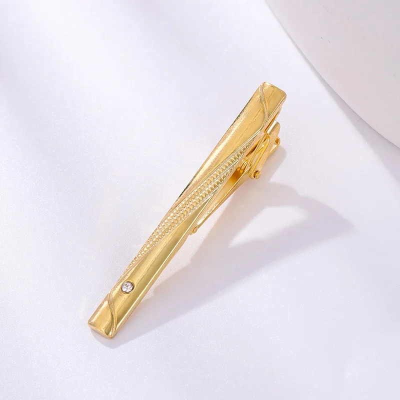 

Elegant Men's Gold Color Tie Clasp; Ideal Accessory for Grooms and Gentlemen.