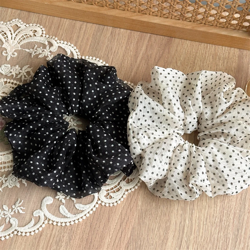 Lightweight Polka-Dot Sheer Scrunchies Offer Delicate Retro Charm With Breathable Mesh Material For Comfortable Styling