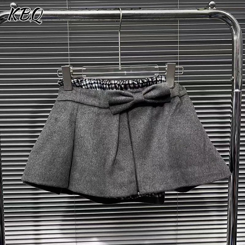 

KBQ Elegant Chic Spliced Bowknots A Line Skirts for Women High Waist Temperament Folds Mini Skirts Female Fashion Autumn Style
