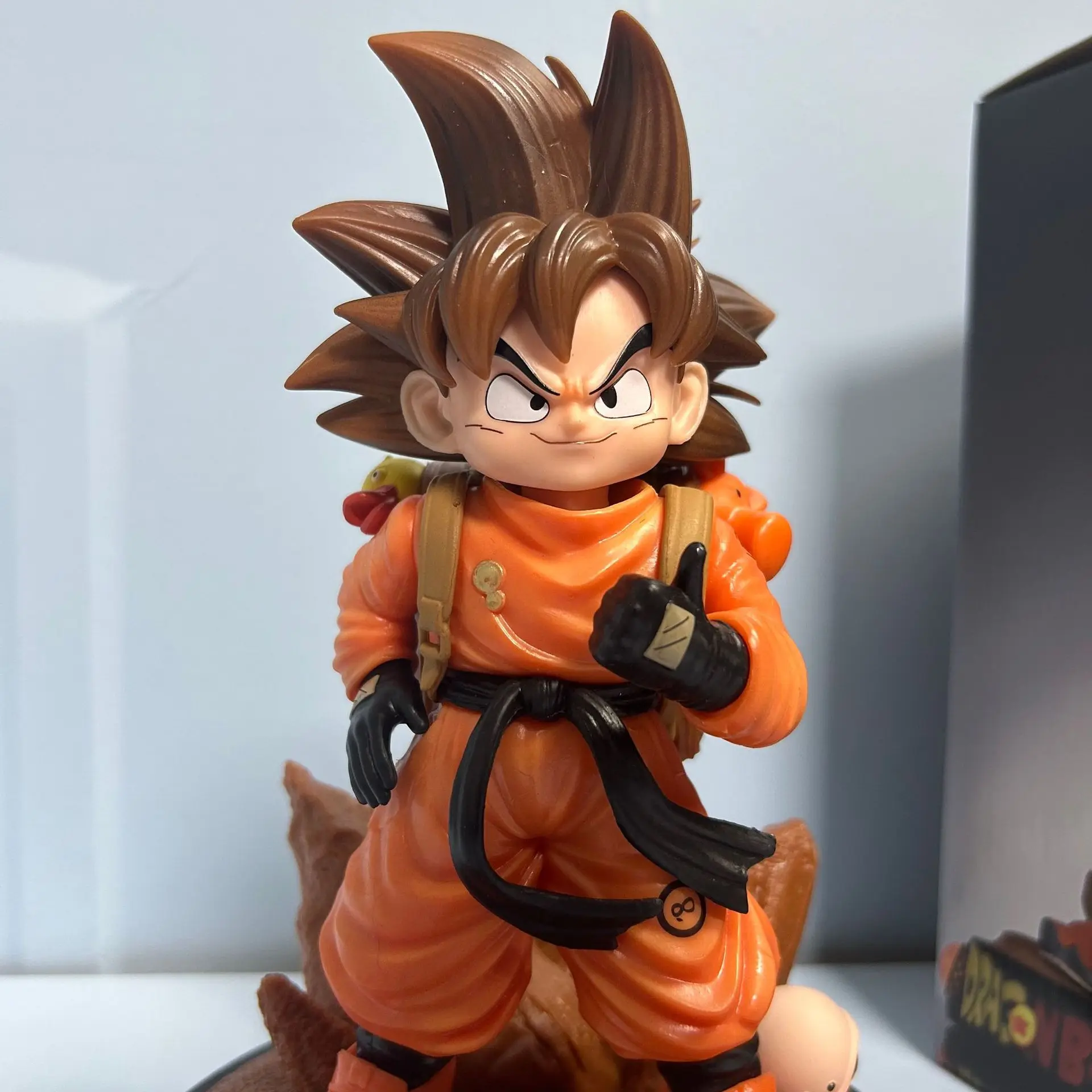 

Dragon Ball Standing Travel goku Q Edition Wukong Figure Box with Base Double Head Carving Dragon Ball Figure Pendulum