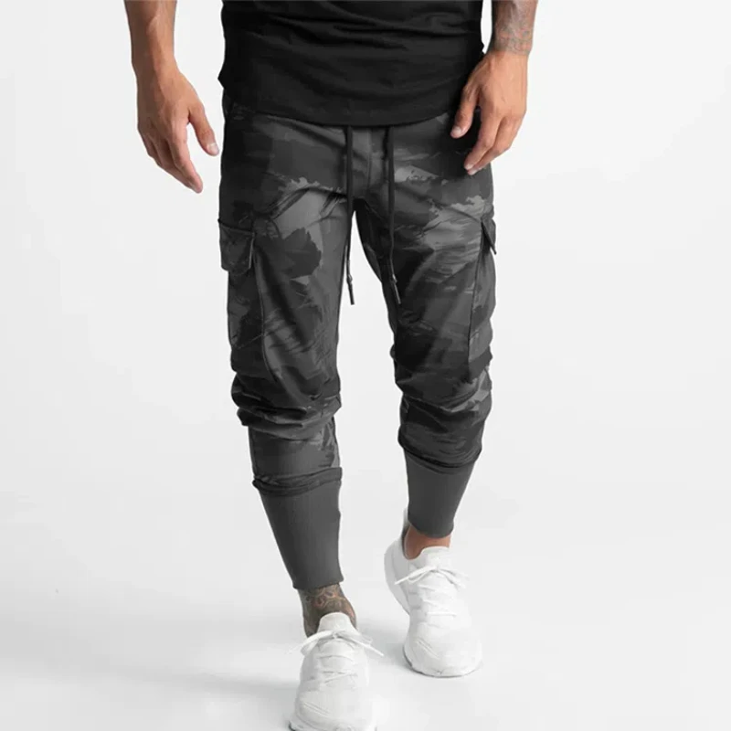 Pantalones casuales de seda de hielo para hombres, pantalones largos deportivos de pies pequeños, hilo de secado rápido, bolsa múltiple juvenil, primavera y otoño