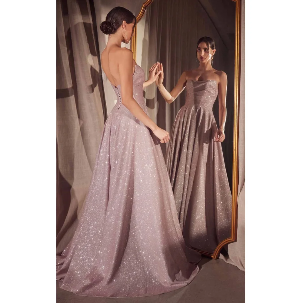 Pink satin A-line—featuring a high slit, an elegant floor-length train, and a sleeveless design; perfect for balls and parties.