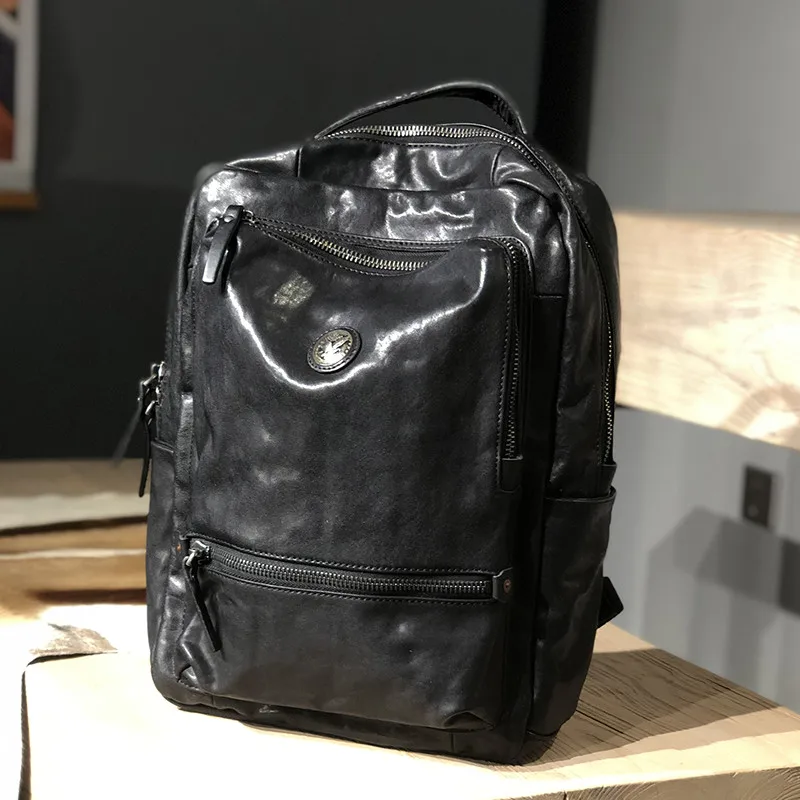 Fashion luxury genuine leather men women's black backpack outdoor travel high quality natural real cowhide work laptop bagpack