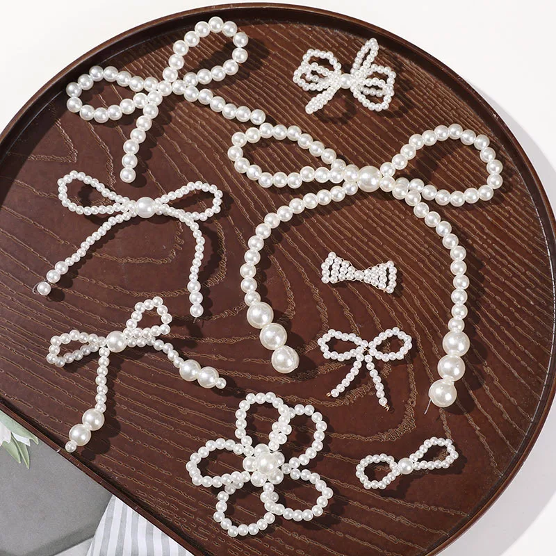 2pcs Wholesale of Japanese imitation pearl bow hollow flowers DIY handmade woven beaded hair clips hair accessories and earrings