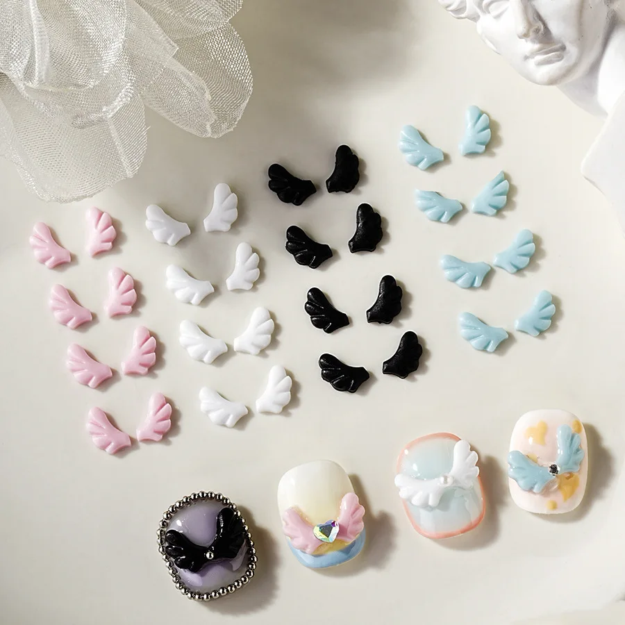 50 pz Nail Ali d'angelo Gioielli in resina 3D Polvere bianca Mini Nail Cahrms Fai da te Sinistra Destra Decorazioni per manicure Accessori Farfalla