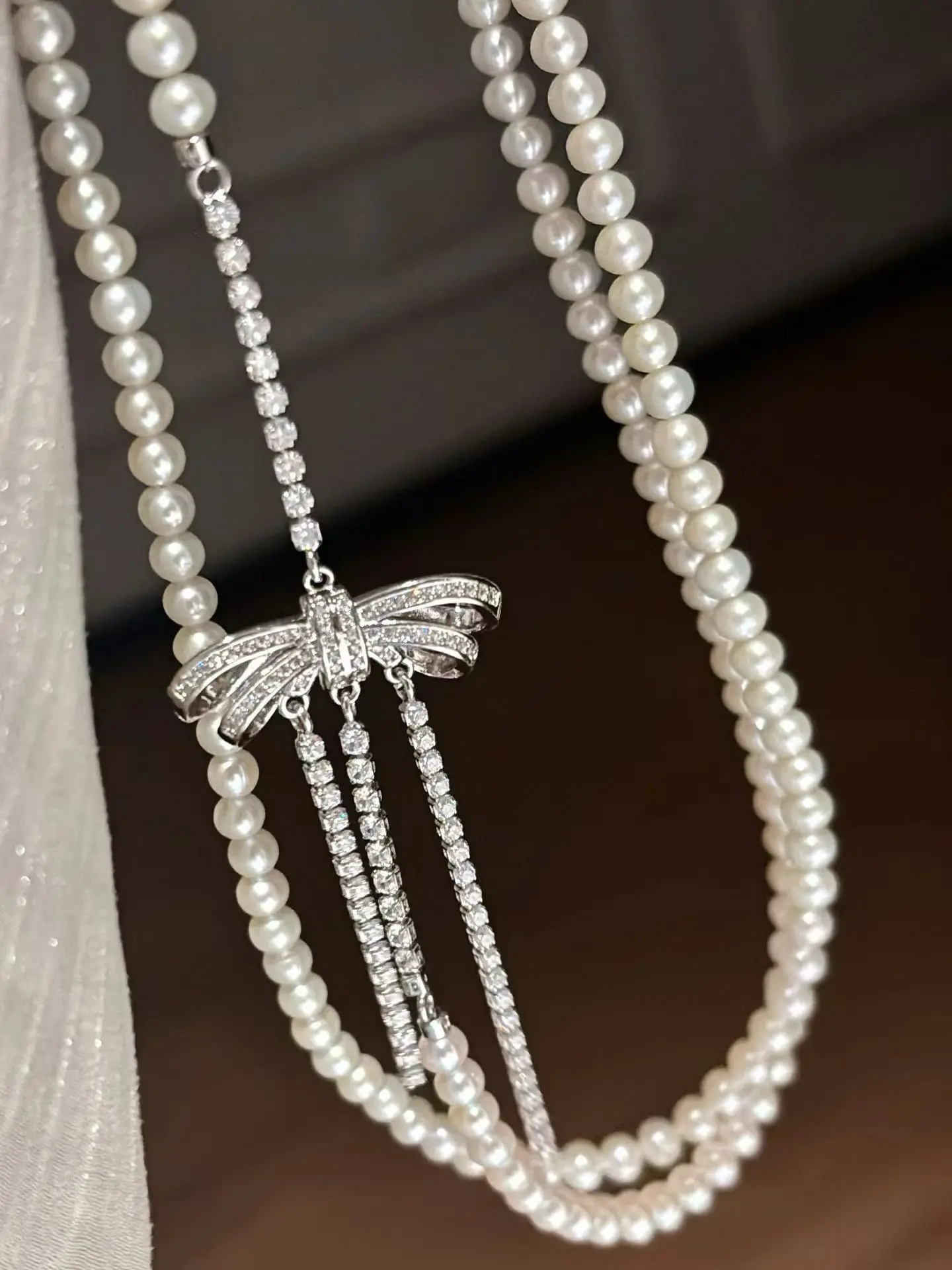 

Certificated Freshwater Pearl Long String 4-5mm Bead Strand With Full Diamond Bowknot Charm Pendant Multi-wears Necklace Jewelry