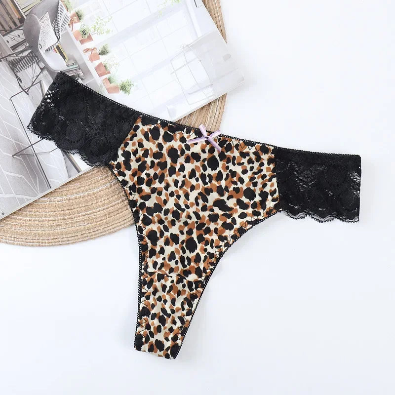 Bragas tipo Tanga de encaje caladas para mujer, Tanga transpirable con estampado de leopardo, ropa interior transparente tentación sin rastro