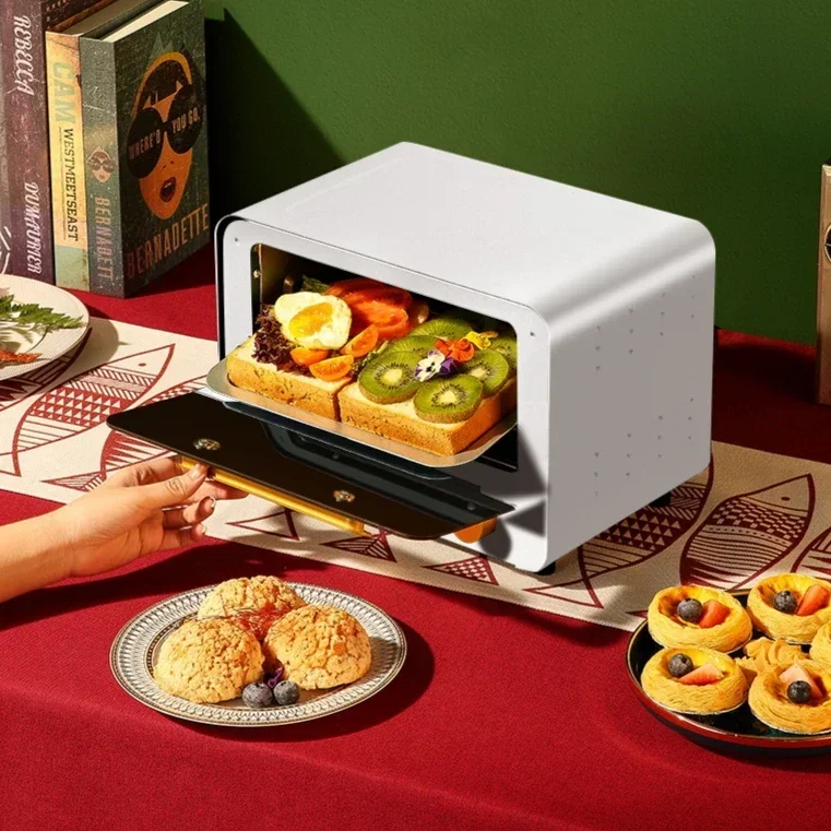 Household electric oven. Multifunc. Small. Breakfast machine. Four-in-one mini. Kitchen small appliance.