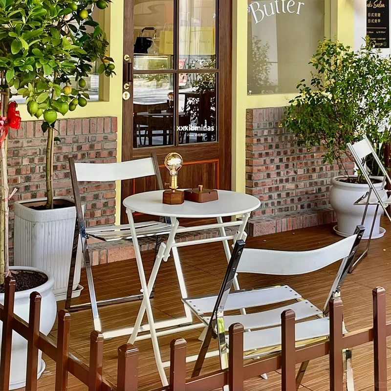 Outdoor balcony tables and chairs in milk tea shops, modern and minimalist saddle chairs, table and chair combination