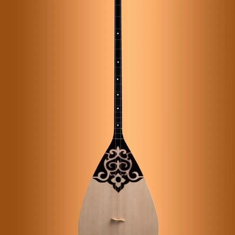 

Solid wood carving to make national musical instruments Kazakh national musical instruments