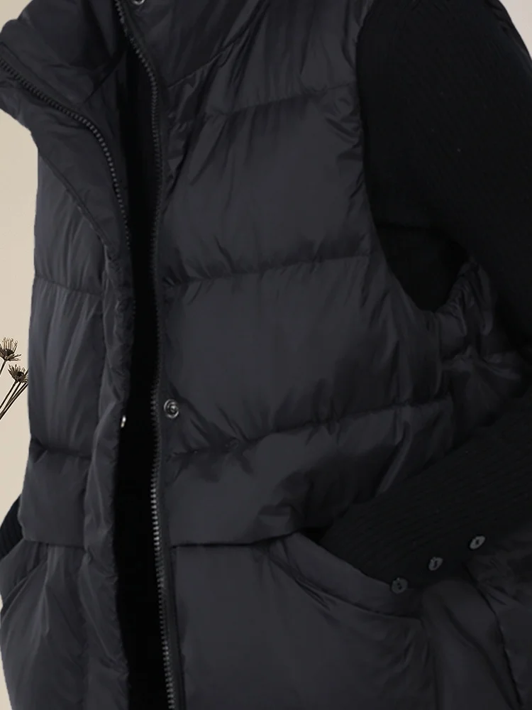 Stylowa, lekka kamizelka puchowa damska, biała, z puchu kaczy, ciepła, bawełniana kurtka, dojazdy do pracy, prosty krój.