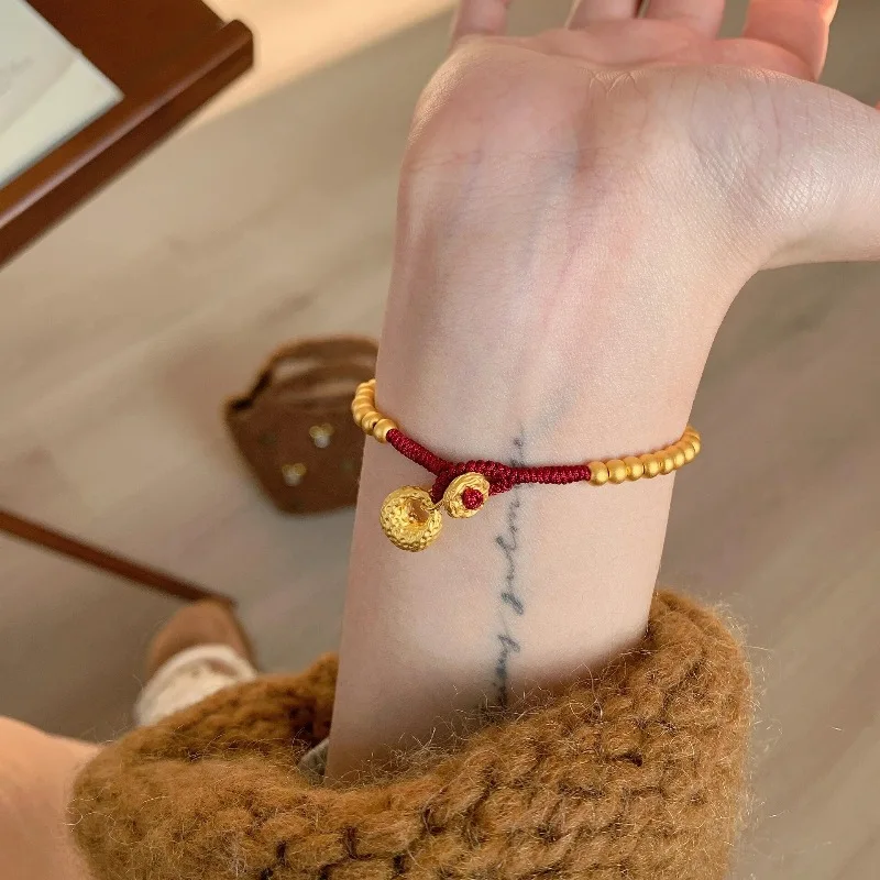 New in antique gold crafts round beads Yuanbao style bracelets red woven rope bag bracelet light luxury simple banquet jewelry view 4