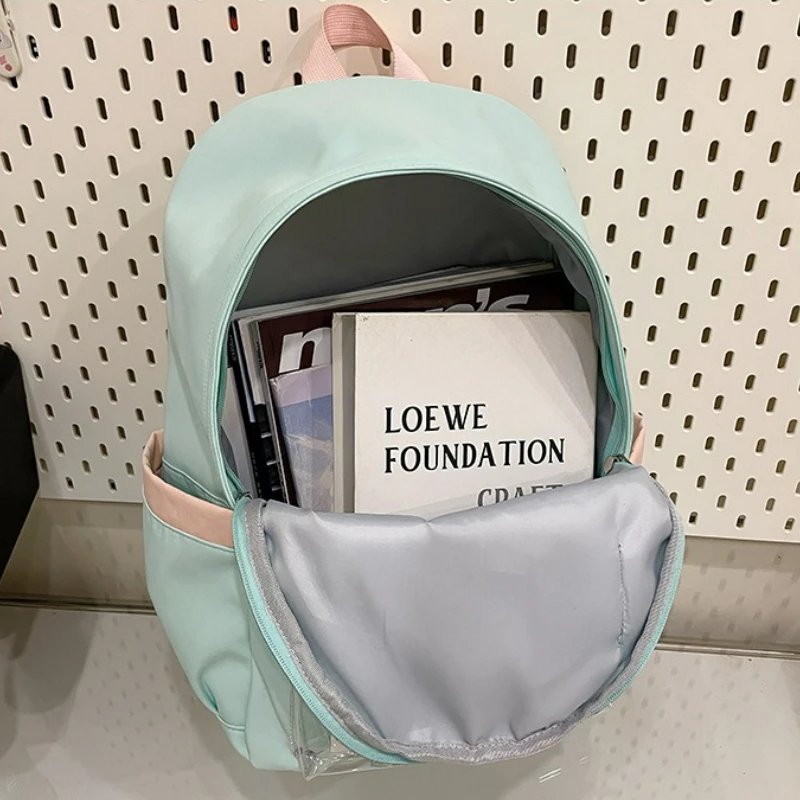 Минималистичный рюкзак большой вместимости. Модная однотонная универсальная нейлоновая сумка. Симпатичная свежая ниша и персонализированный рюкзак.