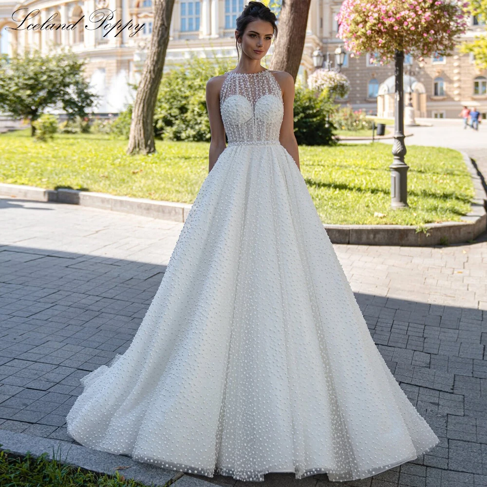 

Lceland Poppy A Line Scoop Neck Wedding Dresses Pearls Beaded Sleeveless Bridal Gowns with Court Train