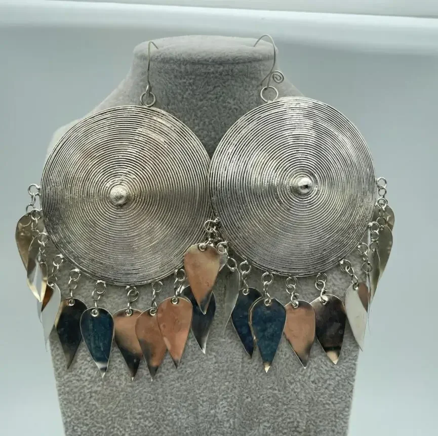 

Miao individual handmade Miao silver earrings domineering exaggerated milk nail big earrings