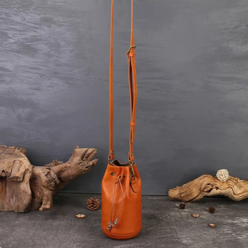 Johnature Handmade Genuine Leather Women's Shoulder Bag 2026 New Retro Drawstring Crossbody Bag Mini Handheld Bucket Bag