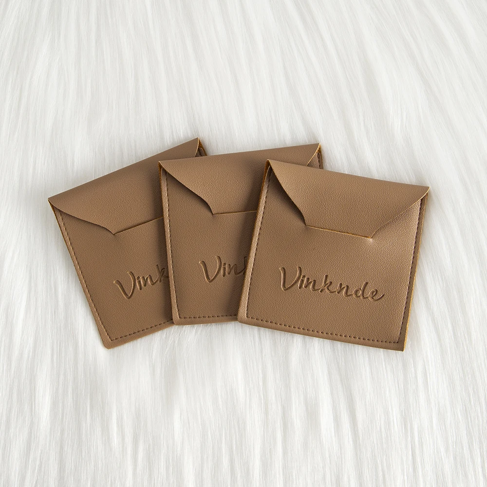 

Пользовательский логотип 50 шт., ювелирные изделия, кожаная сумка 10x10 см, персонализированные кольца из искусственной кожи, серьги, кулон, браслет, ожерелье, сумки для хранения конфет и чая