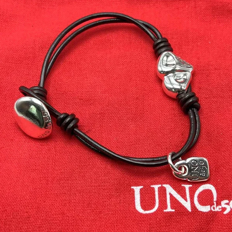 UNOde50-Exquisite Pulseira De Cordão De Couro Em Forma De Coração, Jóias Românticas Das Mulheres, Saco De Presente, Popular na Europa e América, Novo, 2023