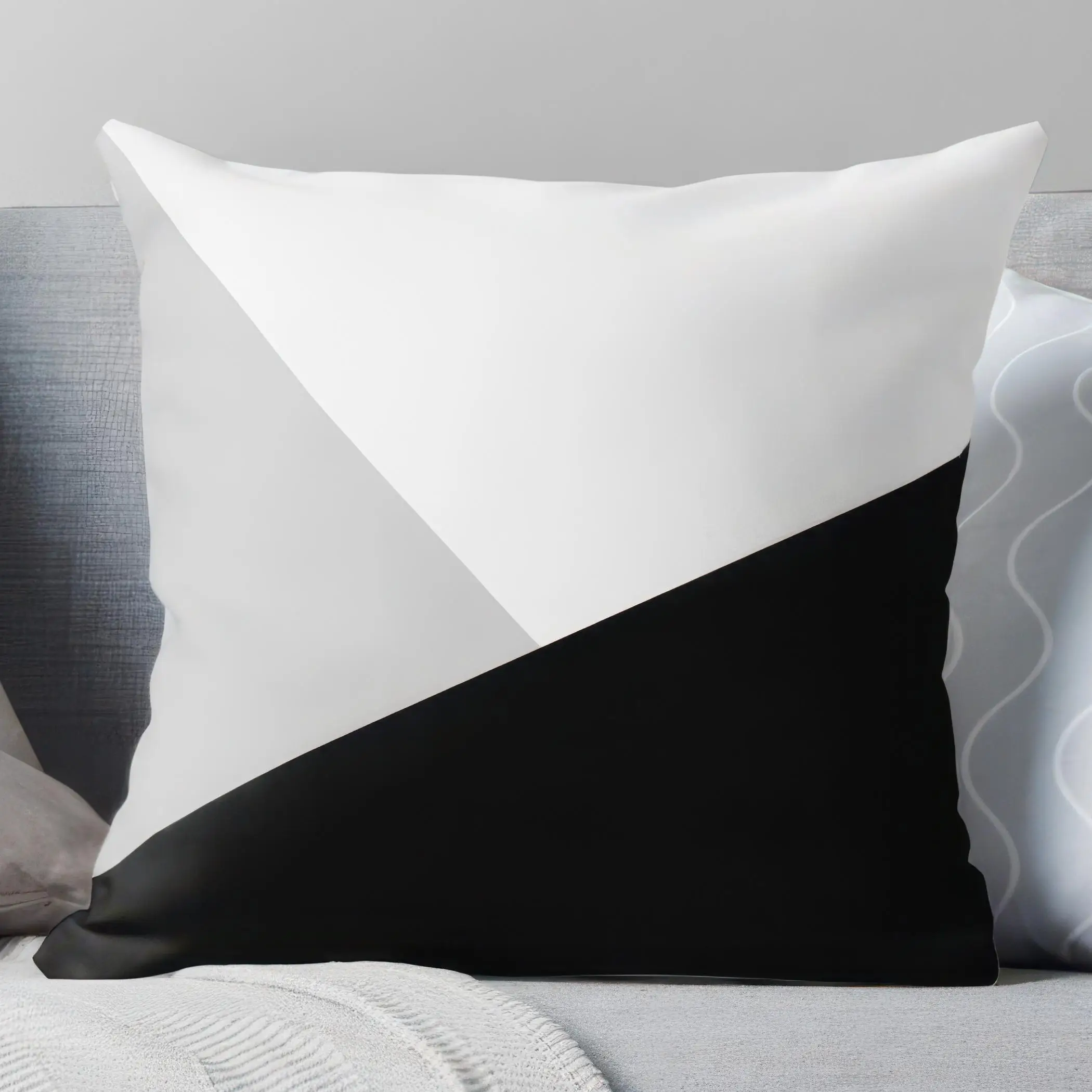 Black, white, and gray geometric patterned pillowcases are machine washable and suitable for bedrooms and living rooms.
