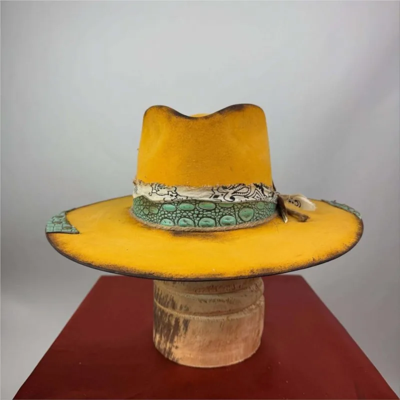 A yellow floral fabric decorative band and felt hat