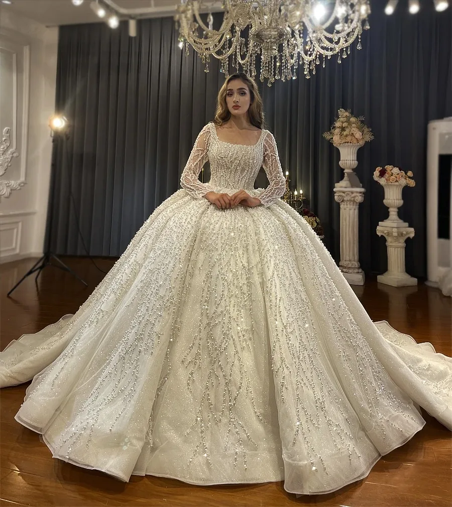 

Customized New Glitter Puffy Arabic Dubai Wedding Dress Square Neck Long Sleeves Crystal Beads Appliqued Lace Women Bridal Gowns
