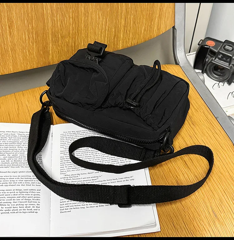 New Portable Nylon Messenger Crossbody Bag Multi‑Pocket Adjustable Strap with Buckle Drawstring for Commute Travel Daily Use