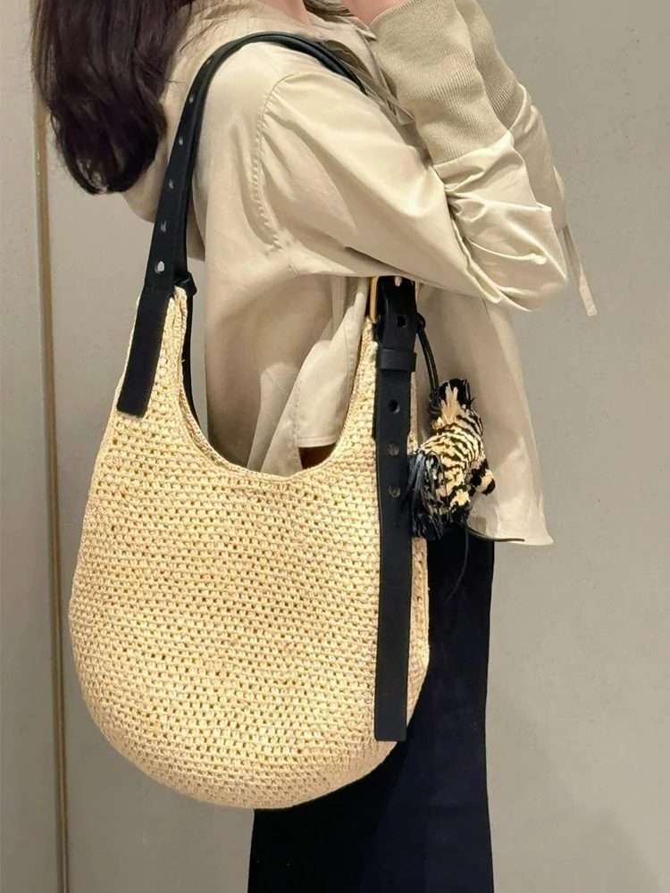 

New Summer Seaside Vacation Beach Women's Bag French Fashion Light Luxury Weaving Hollow Grass Weaving Single Shoulder Bag Trend
