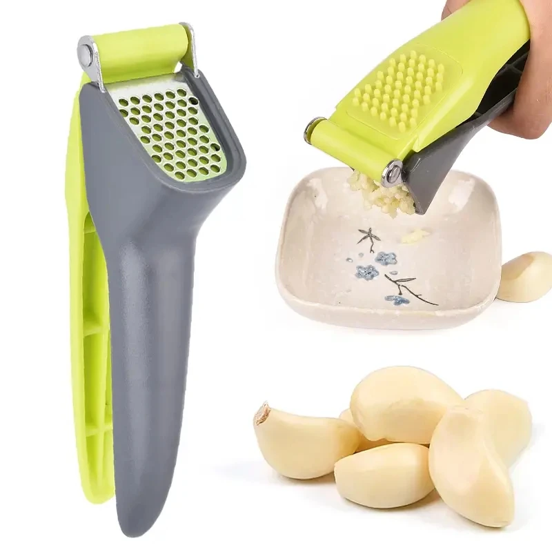 1 garlic press, a tool for crushing and squeezing garlic, a small household outdoor kitchen tool