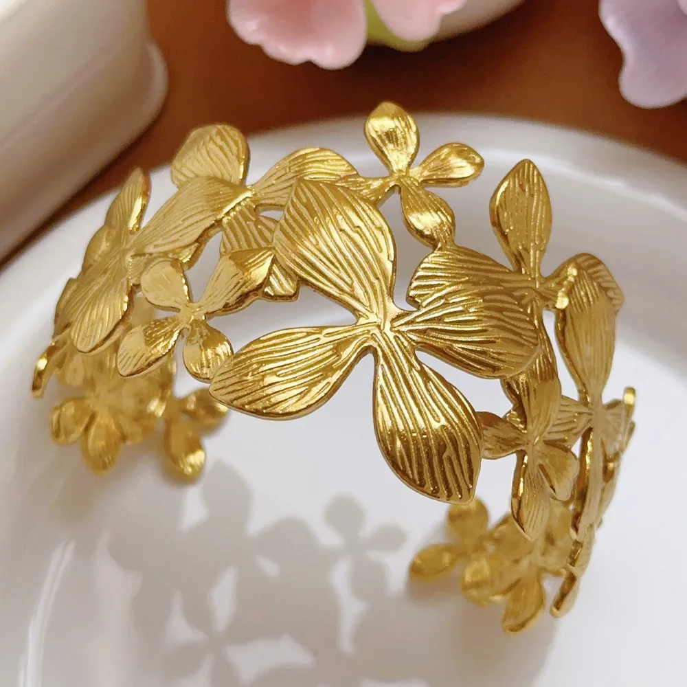 Artistic Gold Color Stainless Steel Open Adjustable Hollowed-out Overlapping Flower Wide-faced Bangle for Girl Designer Jewelry