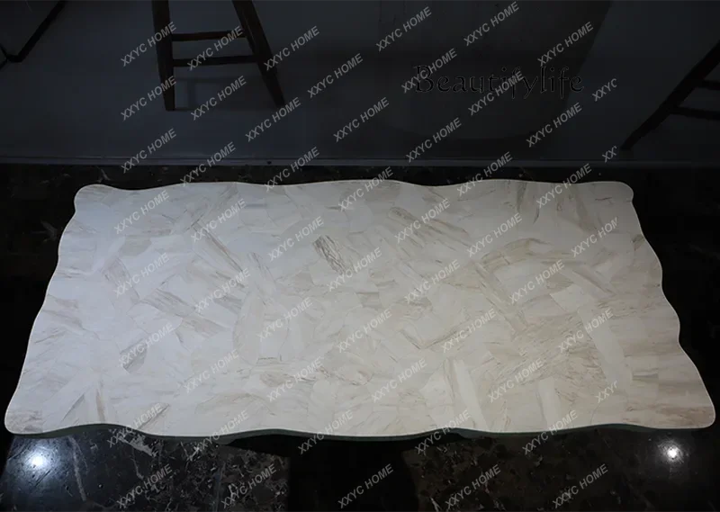 A Natural color matching marble dining table Light luxury villa High-end art design Special-shaped table