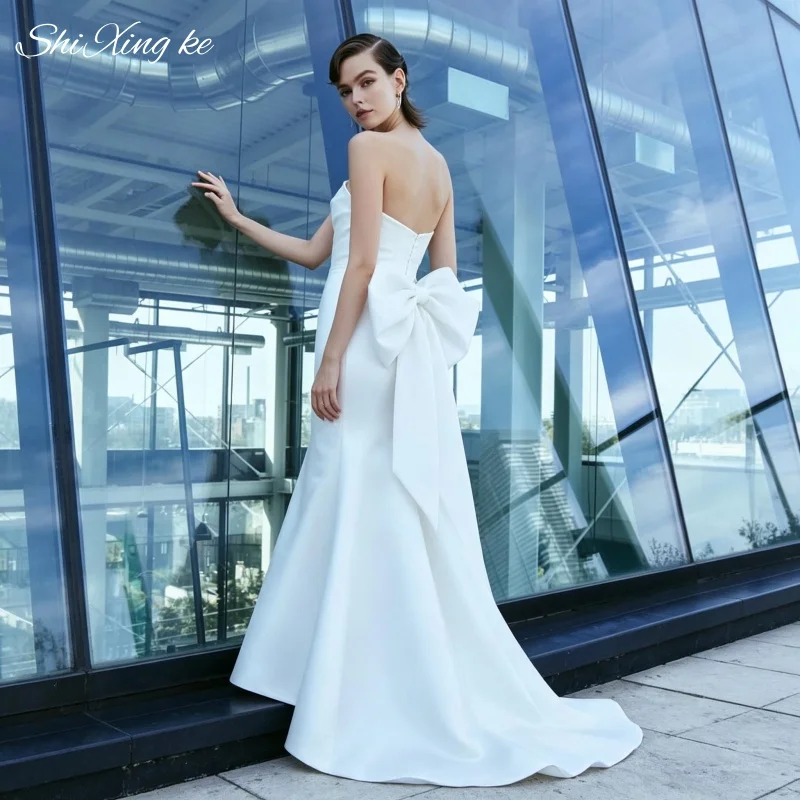 Fitted Mermaid Satin Bridal Dress Strapless Open Back Dramatic Bow Chapel Train Gown Vestidos De Novia Customized