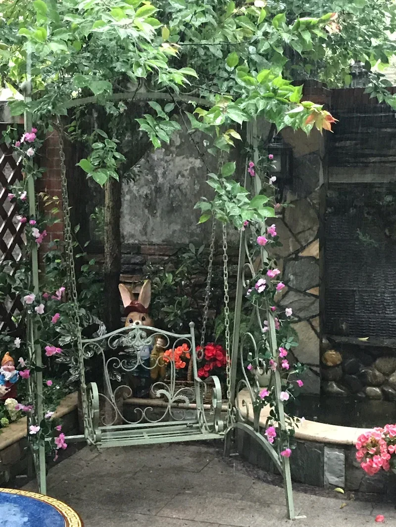 American retro wrought iron outdoor single swing rocking chair