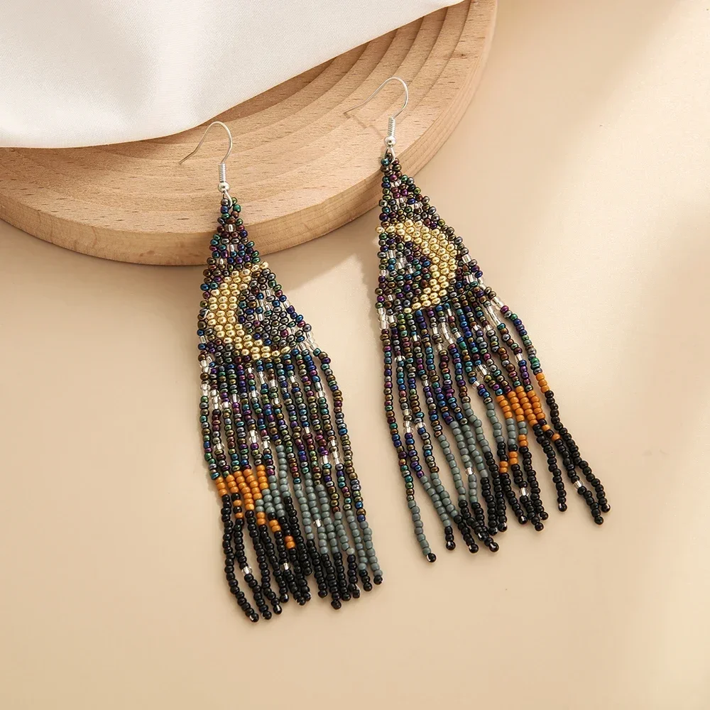 Beaded earrings Tassel Moon Flowers  Female Design Originality Hand knitting Bohemia Alloy Tide Simple Rice bead earrings