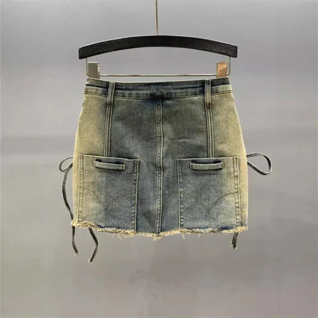 [ZOCI] foro rotto colore sfumato ragazza Denim Design corto cinturino femminile, gonna a vita alta di nicchia a-line che abbraccia l'anca