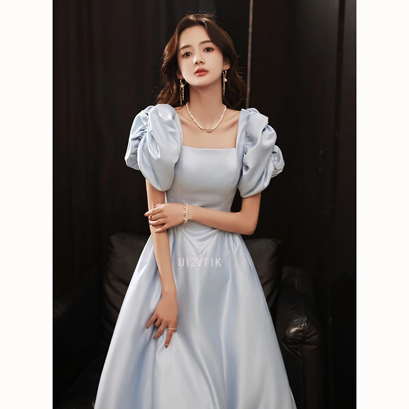 فستان سهرة طويل أزرق فاتح أنيق للولائم وياقة مربعة وحفلات أعياد الميلاد فستان رسمي بسيط بأكمام منتفخة فساتين زفاف 2025