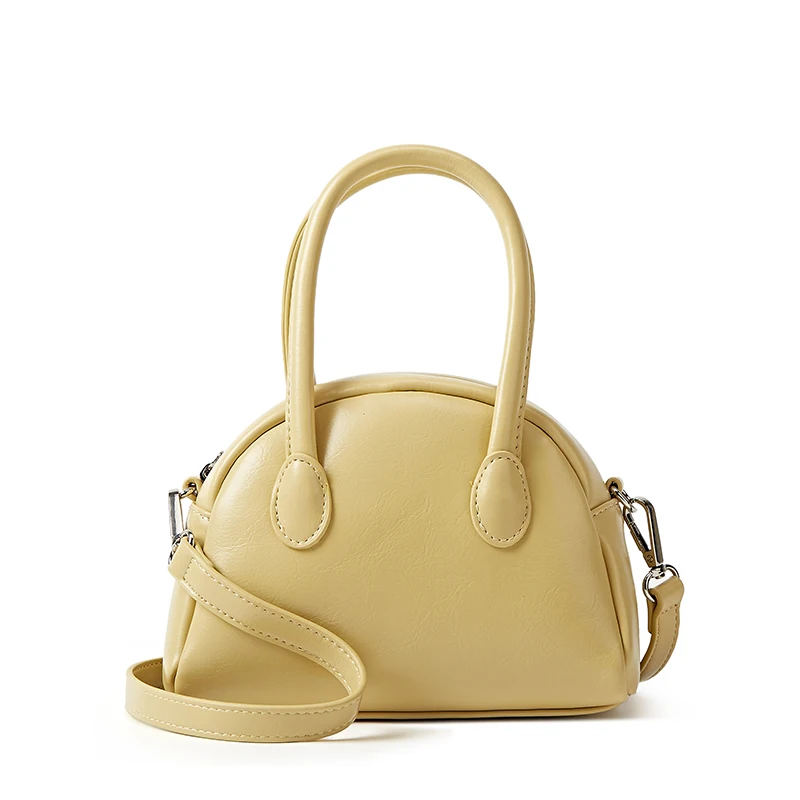 

Simple Korean style handbag, ins bowling bag, casual commuting bag, single shoulder crossbody bag, very suitable for daily use.