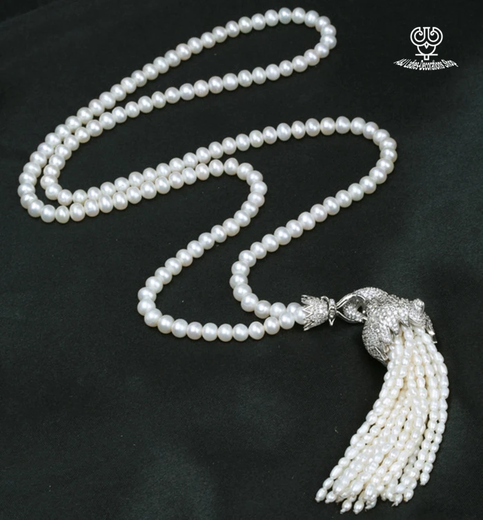 wholesale AA natural handmade 25INCHpearl with Complete zirocn r leopard head 8-9mm and 4-5mmpearl tassel