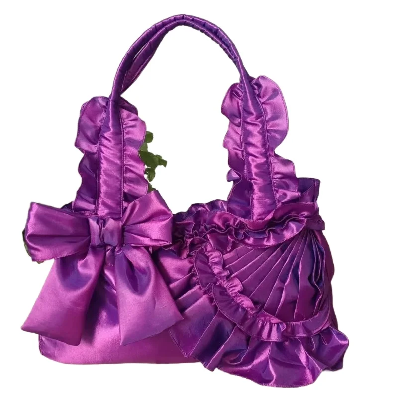 The Color Is Bright and Vivid Handbags ，The New One-shoulder Large Bow Trapezoidal Backpack Is A Single Option for Going Out