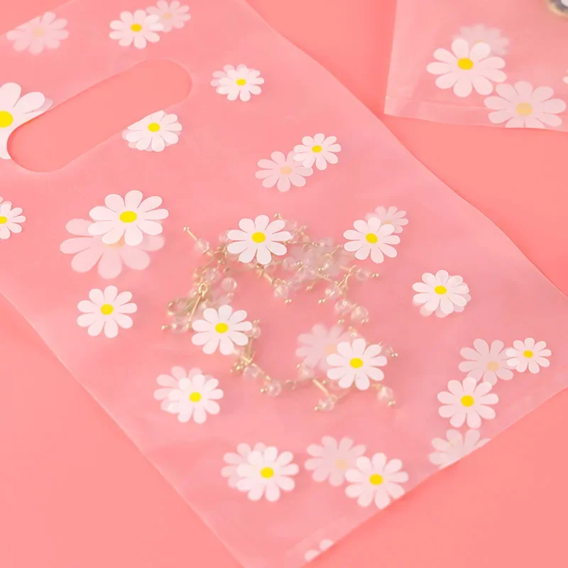 25 teile/los Kleine Plastiktüte für Schmuck/Ohrringe/Schal/Socken Kleine Gänseblümchen Hochzeit Geschenk Taschen Mini Verpackung taschen für Business – Detail 1