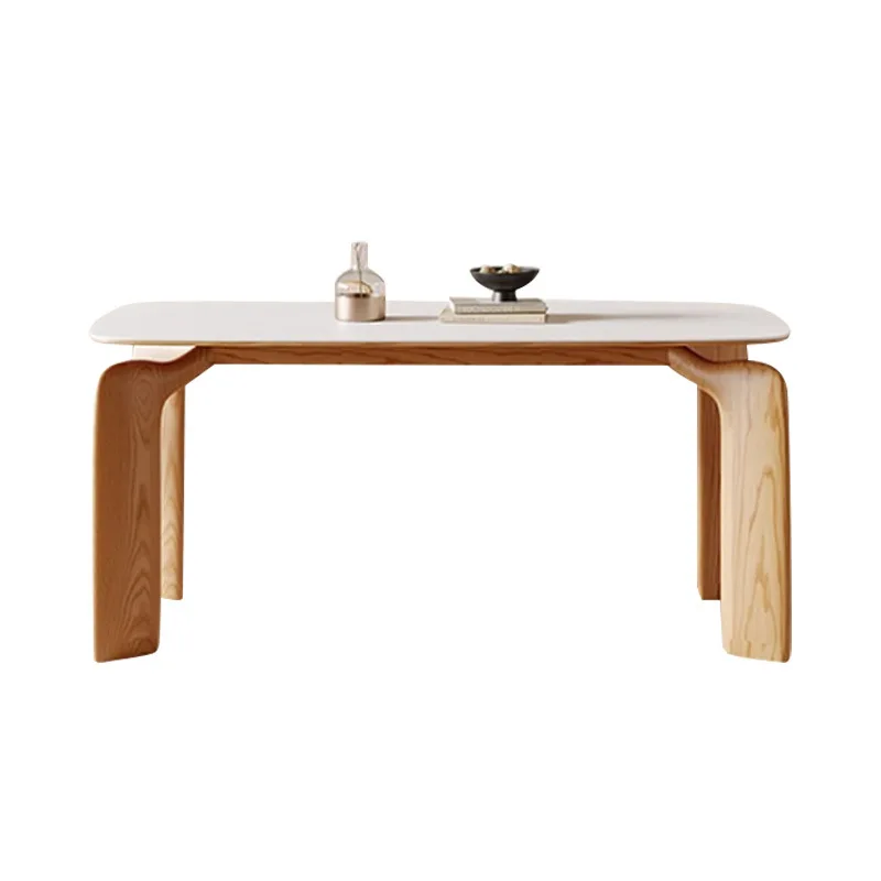 

Log color cream style elephant leg rock slab dining table modern light luxury household small apartment rectangular solid wood