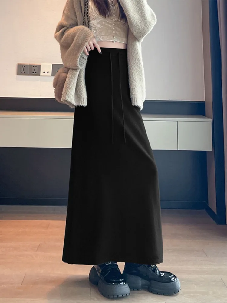 กระโปรงไหมพรมถักสไตล์เรโทรระดับไฮเอนด์ ทรงเอไลน์แบบสบายๆ สำหรับผู้หญิง กระโปรงทรงห่อแบบลำลอง ใส่ได้ทั้งฤดูใบไม้ร่วงและฤดูหนาว บุด้วยโพลีเอสเตอร์อย่างดี ให้ความรู้สึกสบาย