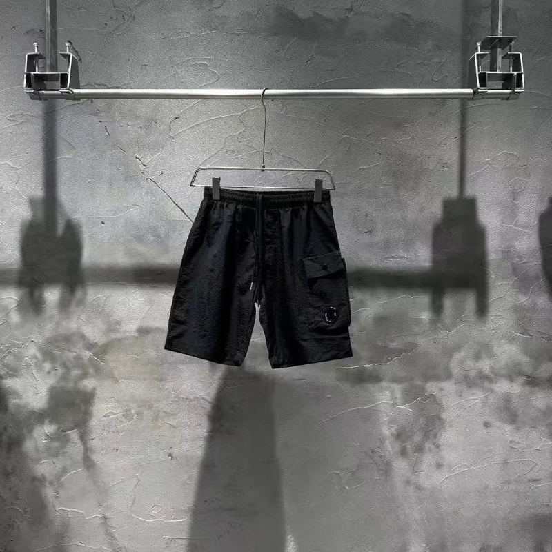 Tide Street Style Модные функциональные стильные быстросохнущие шорты Свободные повседневные повседневные шорты для пар с пятью брюками Мужские спортивные шорты